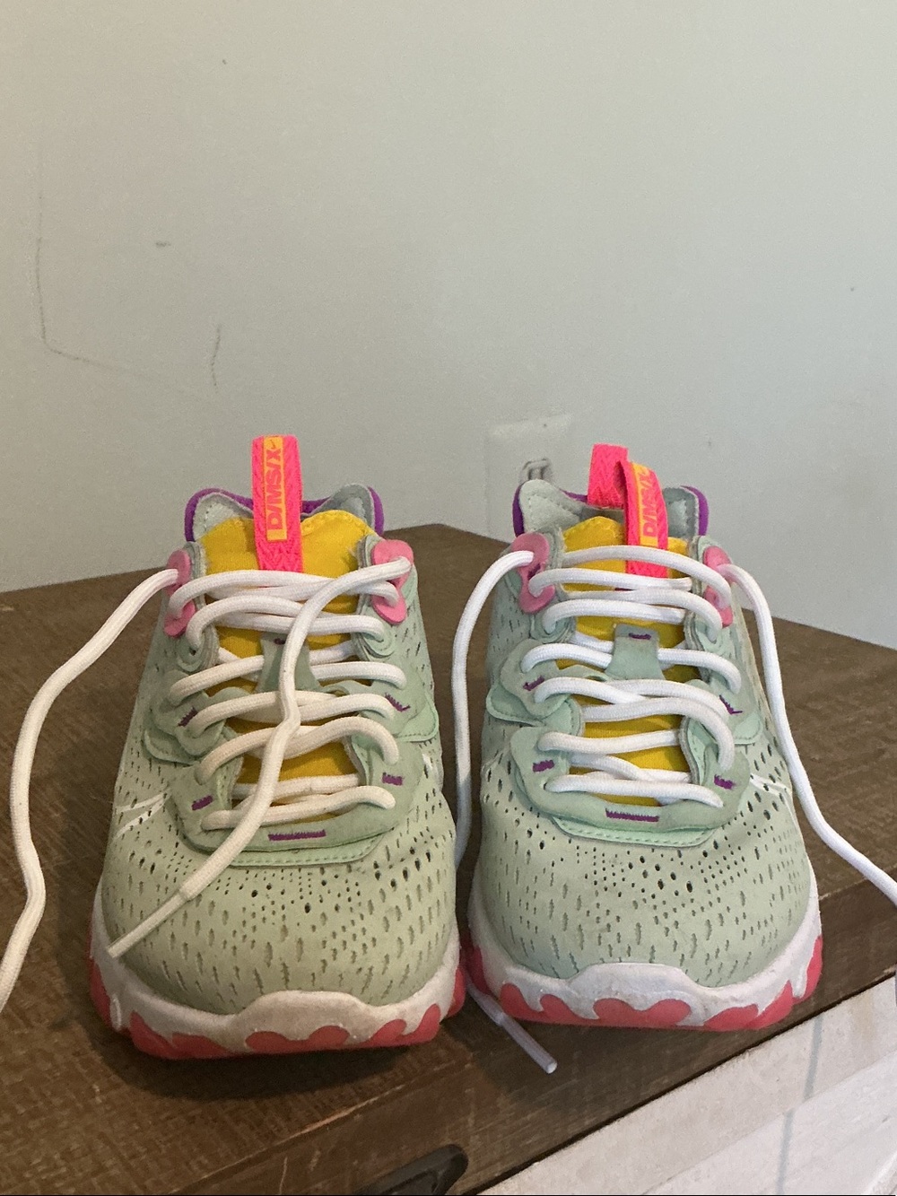 Nike Mint Sneakers with Pink and Yellow Accents!